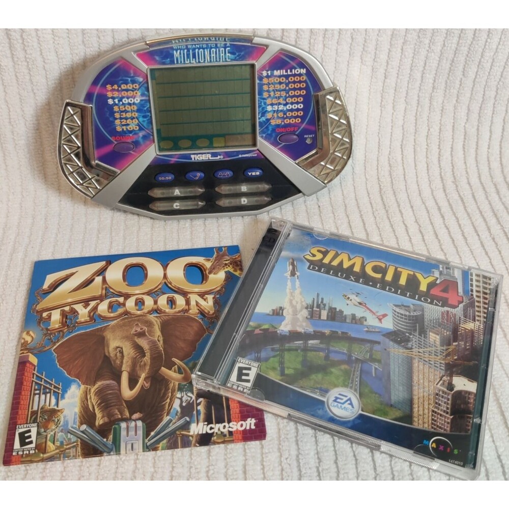 Vintage Lot of 3 items-One Electronic Handheld Game and Two PC Games-Pre Owned